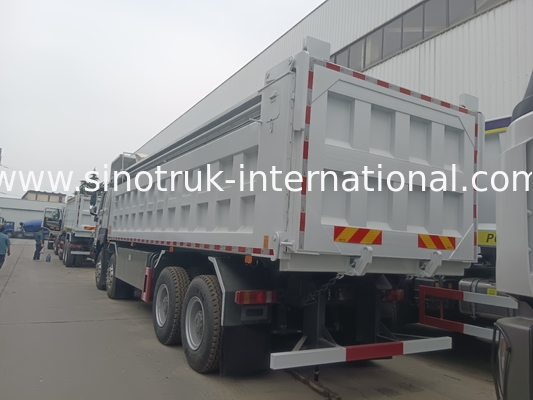 SINOTRUK HOWO 380HP टिपर डंप ट्रक 12 पहिया LHD 31 टन 20-30CBM V7-X कैब
