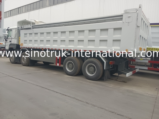 SINOTRUK HOWO 380HP टिपर डंप ट्रक 12 पहिया LHD 31 टन 20-30CBM V7-X कैब