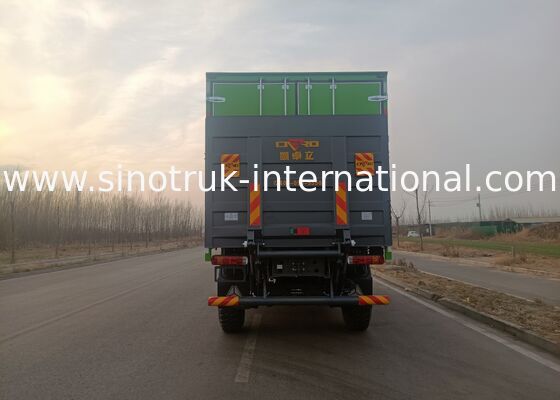 SINOTRUK भारी ड्यूटी ट्रक जिसमें 4X4 LHD ड्राइव प्रकार, 5000*2300*2300 मिमी कार्गो टैंक, और भारी भार ढोने के लिए 16T रियर एक्सल क्षमता है
