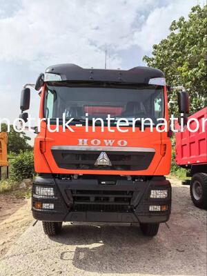 SINOTRUK HOWO TX मॉडल 380HP LHD टिपर डंप ट्रक 6X4 U-प्रकार कंटेनर सफेद