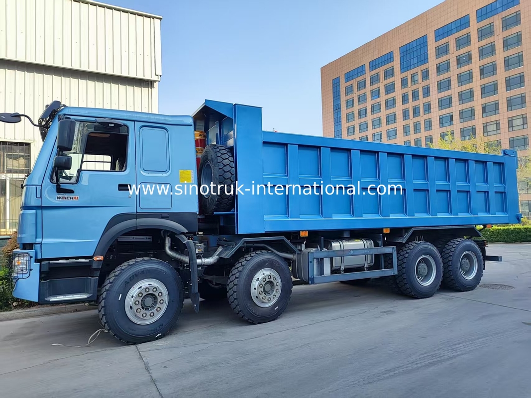 आकर्षक ब्लू HOWO 8×4 380HP 26.91CBM डंप ट्रक जहां पावर हर लोड में सटीकता से मिलता है!