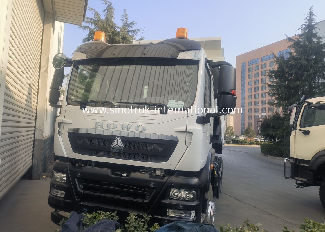 HOWO TX भारी शुल्क वाला ढोने वाला वाहन जिसमें 300L ईंधन टैंक क्षमता और भारी भार परिवहन के लिए स्टील बॉडी सामग्री है